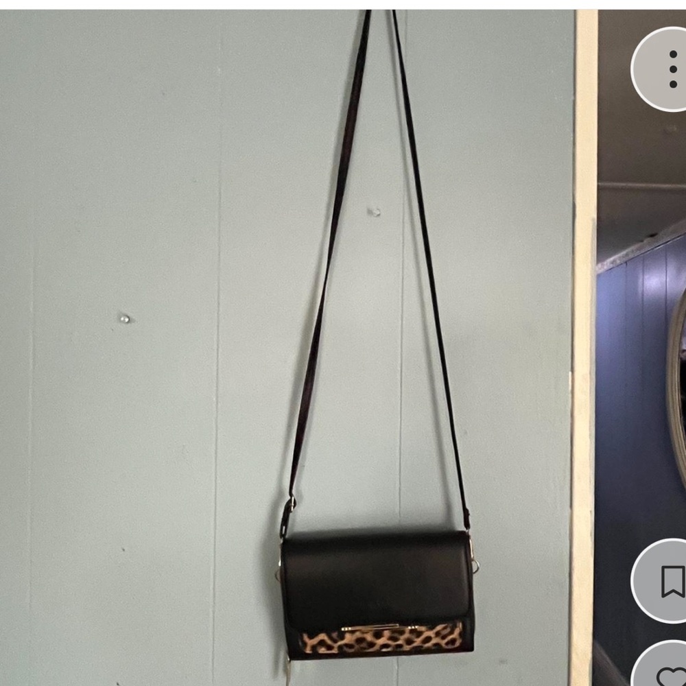 Elegant Black Crossbody Bag with Leopard Accent